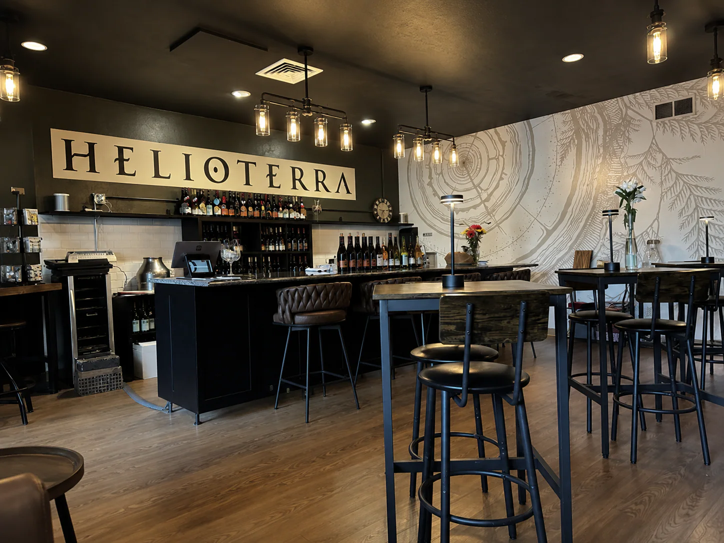 Cedar Tree Rings mural retained in the space after it became Helioterra wine bar